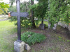 Лайдзская волость, июль 2020 г. Место захоронения Карла Фердинанда Аменда. Металлический крест с эпитафией.