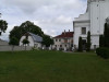 Краслава, костел св. короля Людвига IX, июль 2020 г. Вид на здание бывшей духовной семинарии со стороны церковного сада.