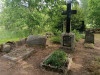 Дундагский край, Дундагская волость, кладбище Кужниеку, июнь 2023. Крест на могиле Петериса и Марии Дравниекс